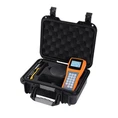 How does the temperature affect the performance of a portable hardness tester?